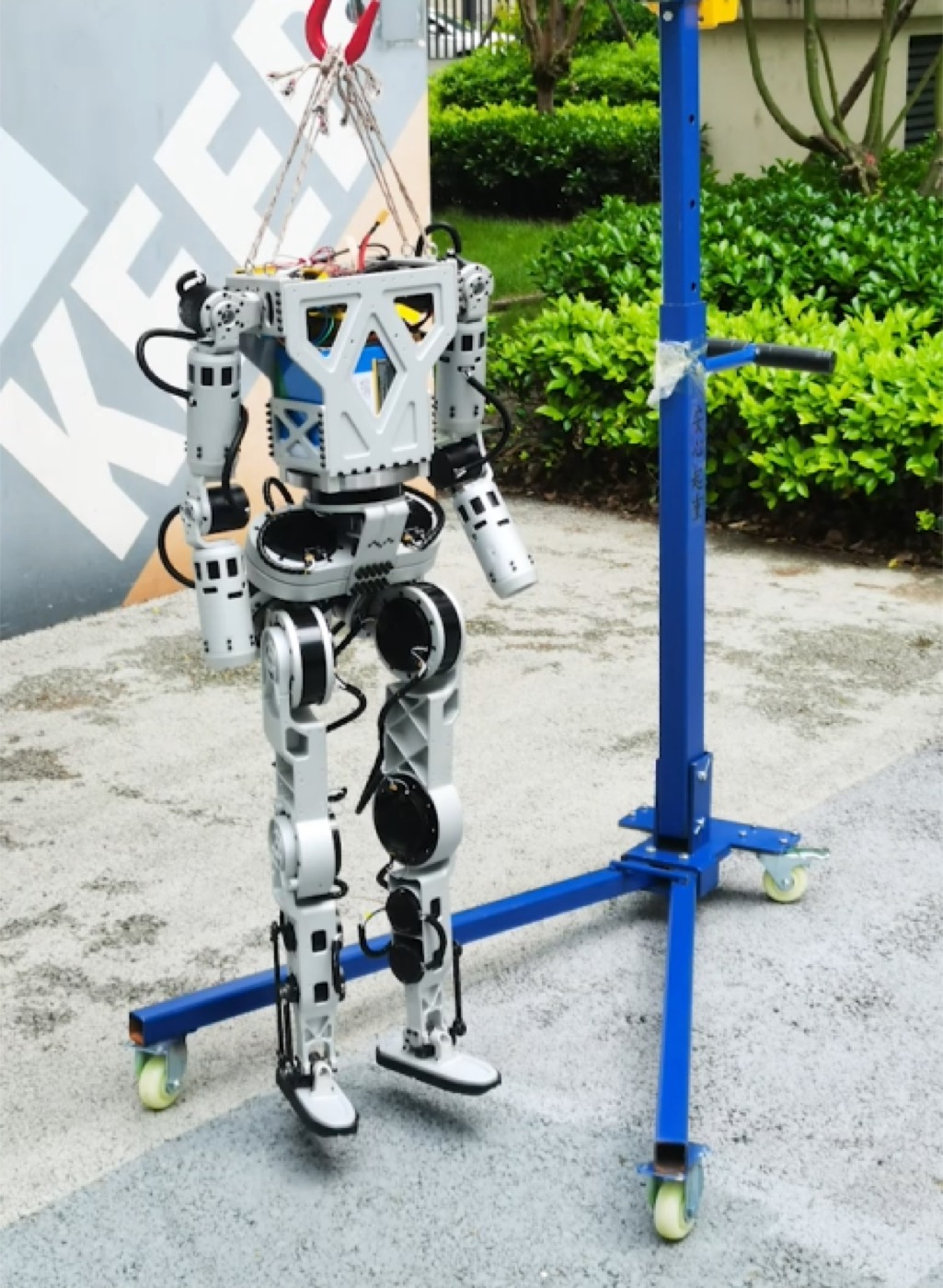 NV-01 without the shell on a hoist: CNC frame, X-truss chest, cables